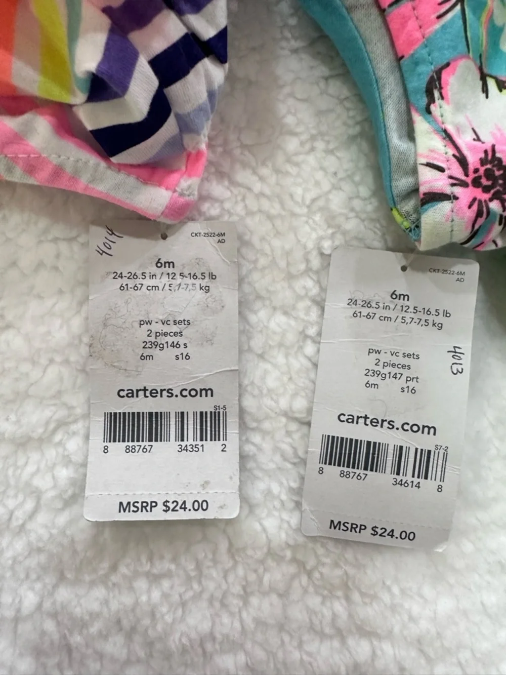 Two infant girl’s Carter’s summer outfits
